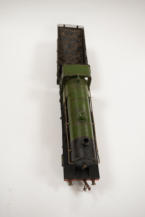 An 0 gauge Bing (or possibly Carette) for Bassett-Lowke tinplate clockwork GNR 4-4-2 tender locomotive, 1442, with original clockwork mechanism in yellow and black lined green livery